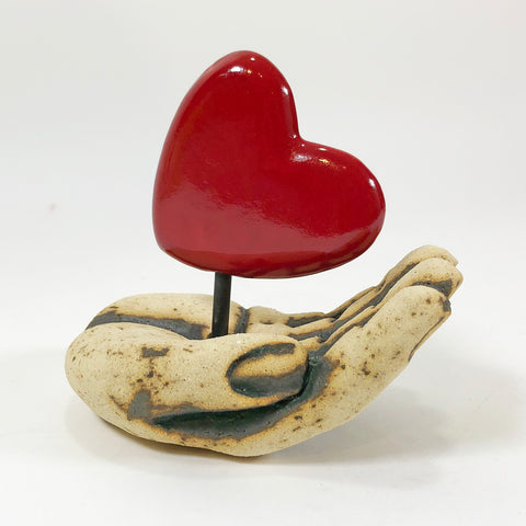 Hand Holding Heart Tabletop Sculpture