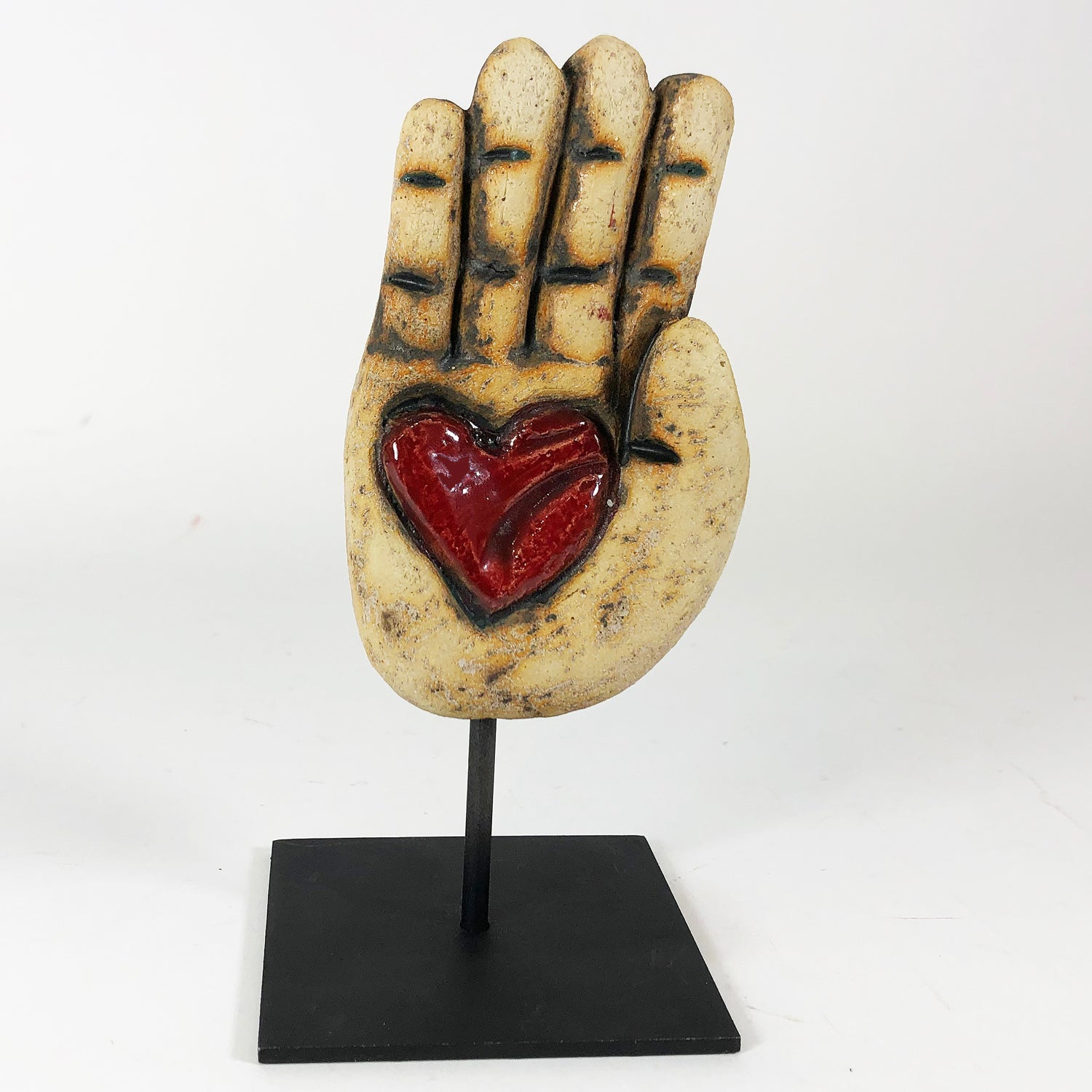 Heart In Hand Clay Sculpture